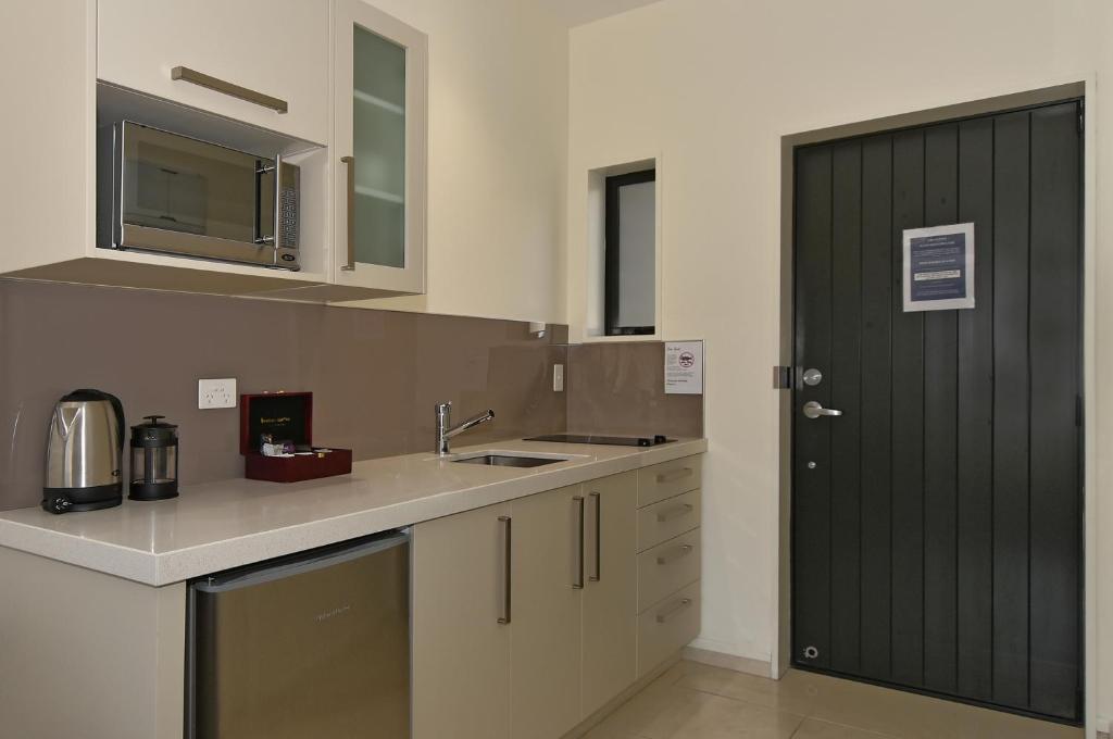 Kuchyň nebo kuchyňský kout v ubytování Aoraki Court Motel