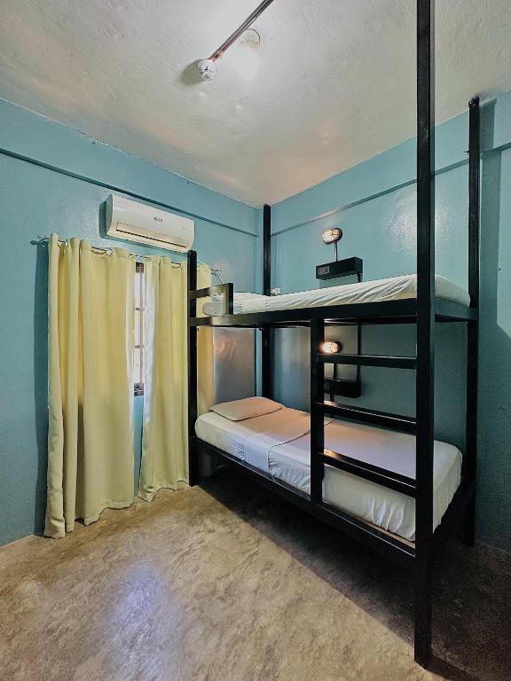 Cama o camas de una habitación en Dayon Hostel
