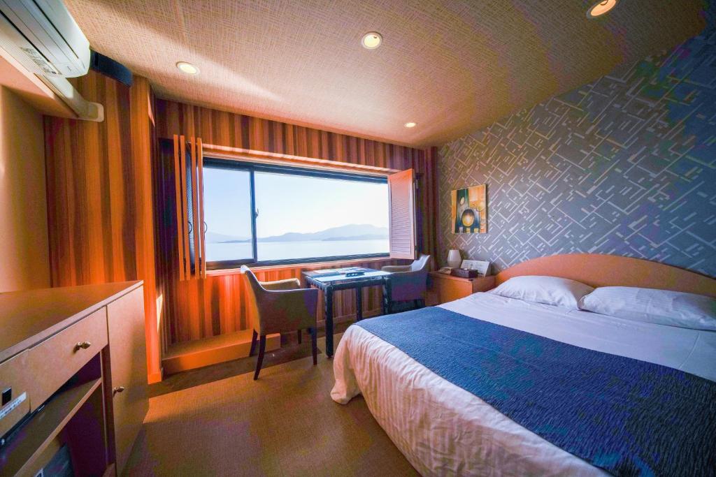 Postel nebo postele na pokoji v ubytování ホテル ラヴィアン HOTEL Lavien