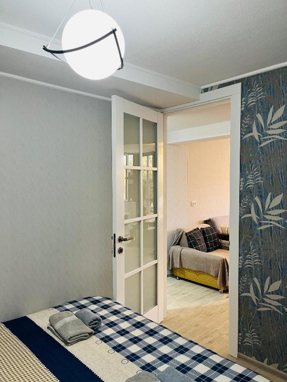 Postel nebo postele na pokoji v ubytování Guest house poligloti