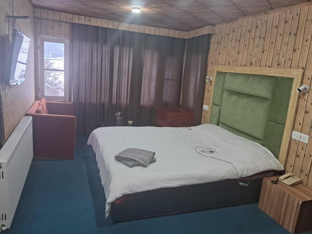 古爾默爾格的住宿－zoz gm1，一间卧室,卧室内配有一张大床