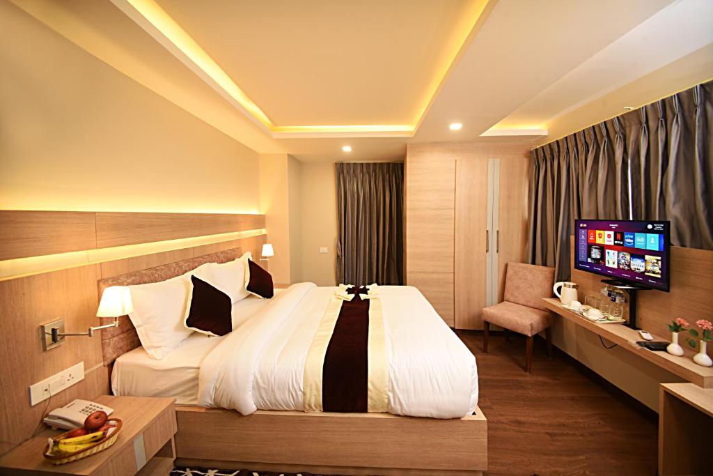 Postel nebo postele na pokoji v ubytování Divine Kathmandu Hotel