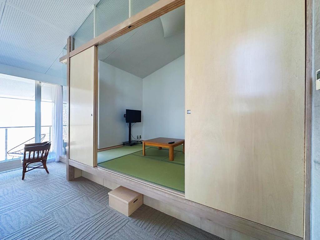 TV a/nebo společenská místnost v ubytování Karuizawa Tennku Hotel & Resort