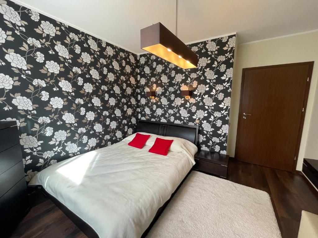 Postel nebo postele na pokoji v ubytování Apartament Słoneczny na Krzywej