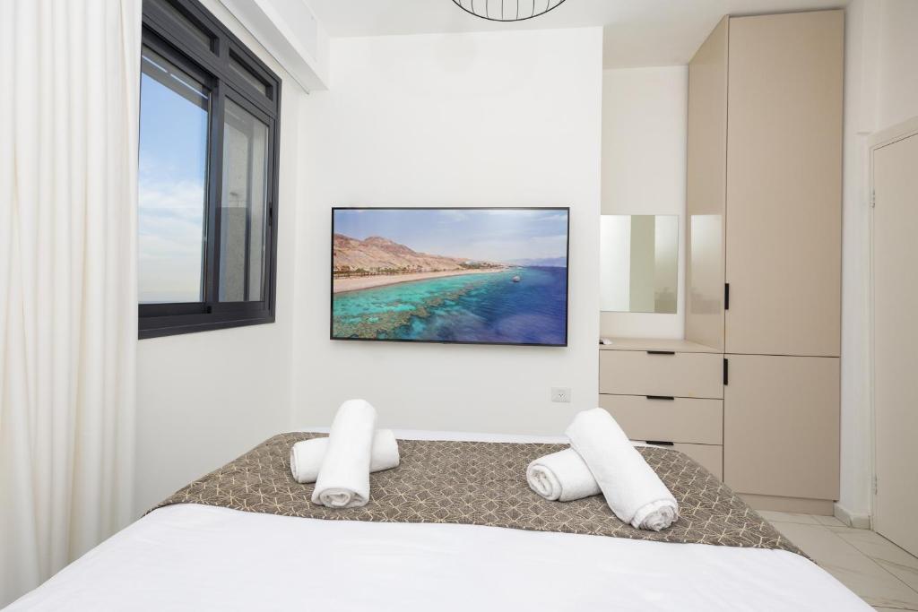 Postel nebo postele na pokoji v ubytování Villa Neil Yam Eilat