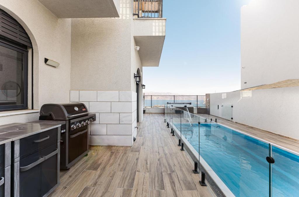 Bazén v ubytování Villa Neil Yam Eilat nebo v jeho okolí