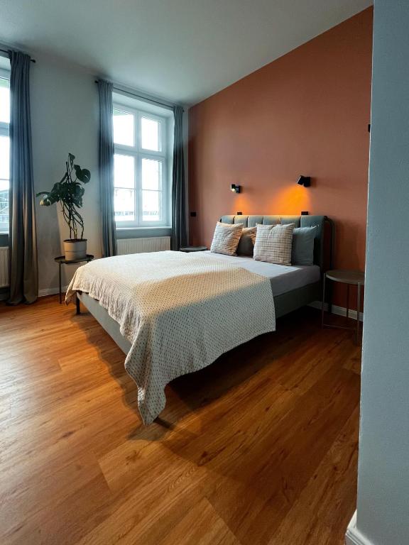 Postel nebo postele na pokoji v ubytování Studios am Hafen