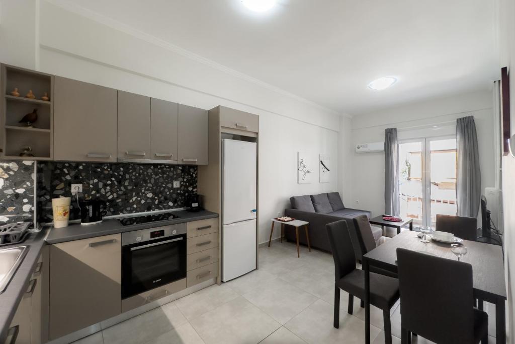 Kuchyň nebo kuchyňský kout v ubytování New Spacious & Stylist Apt