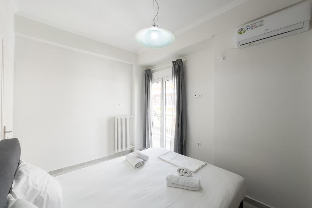 Postel nebo postele na pokoji v ubytování New Spacious & Stylist Apt