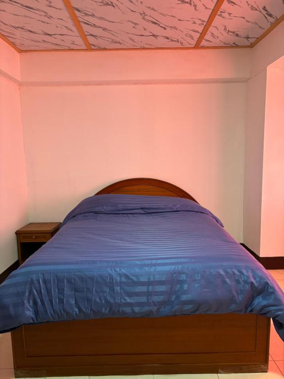 Postel nebo postele na pokoji v ubytování My Hotel Bangkok Noi