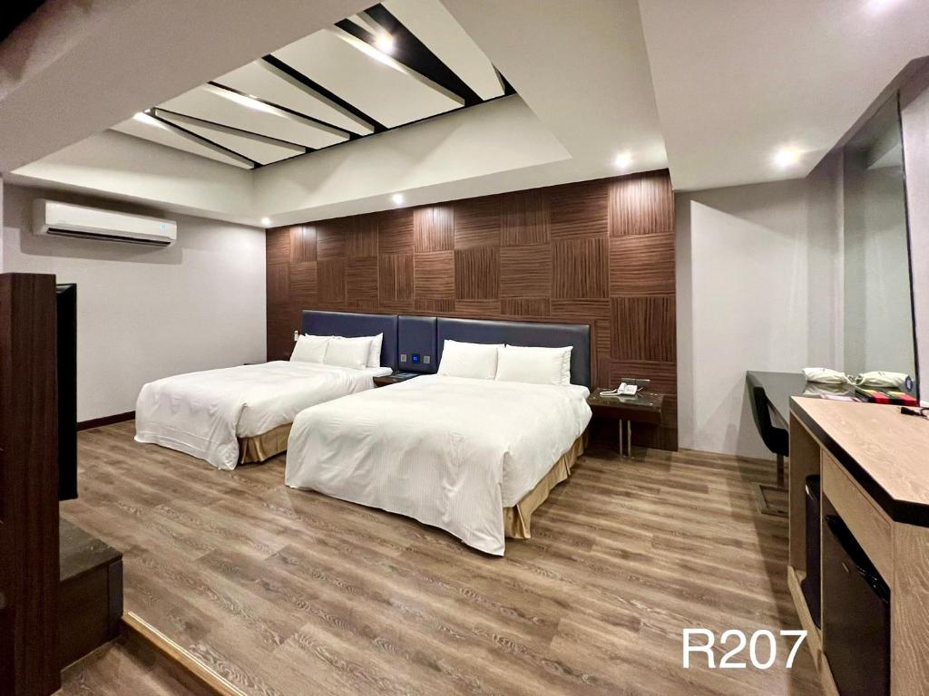 Postel nebo postele na pokoji v ubytování Cigar Motel