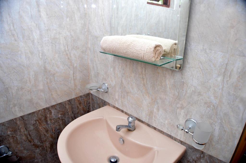 Koupelna v ubytování Binara Home Stay