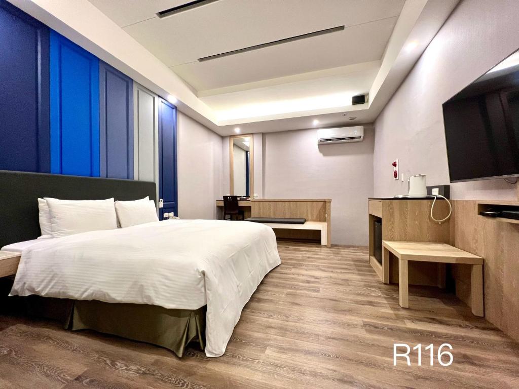 Postel nebo postele na pokoji v ubytování Cigar Motel