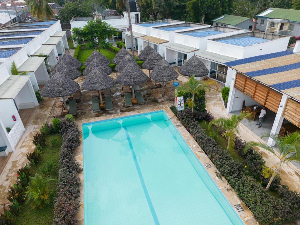 an overhead view of a pool at a resort at Mafia Dream Hotel in Kilindoni
