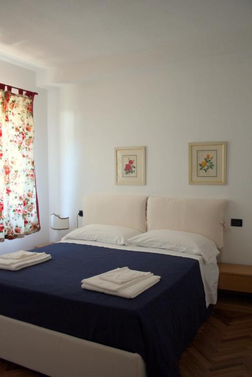 Postel nebo postele na pokoji v ubytování Hibiscus B&B