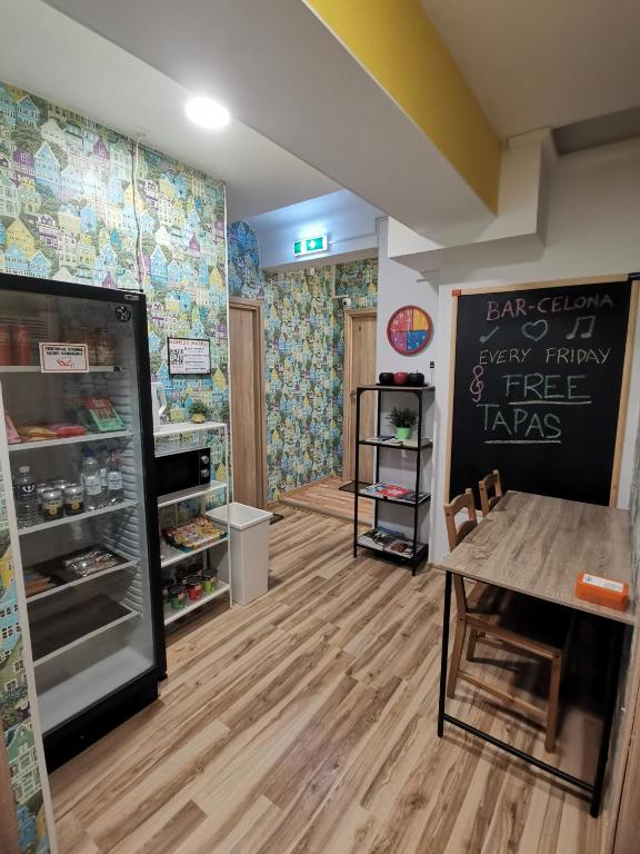 Kuchyň nebo kuchyňský kout v ubytování Tiki Taka Hostel & Pub
