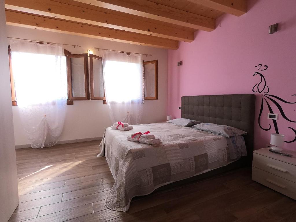 Ένα ή περισσότερα κρεβάτια σε δωμάτιο στο B&B Il Sentiero