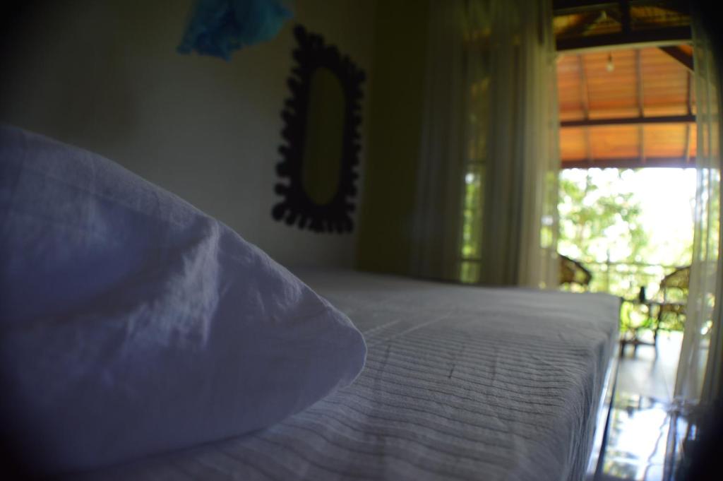 Postel nebo postele na pokoji v ubytování Binara Home Stay