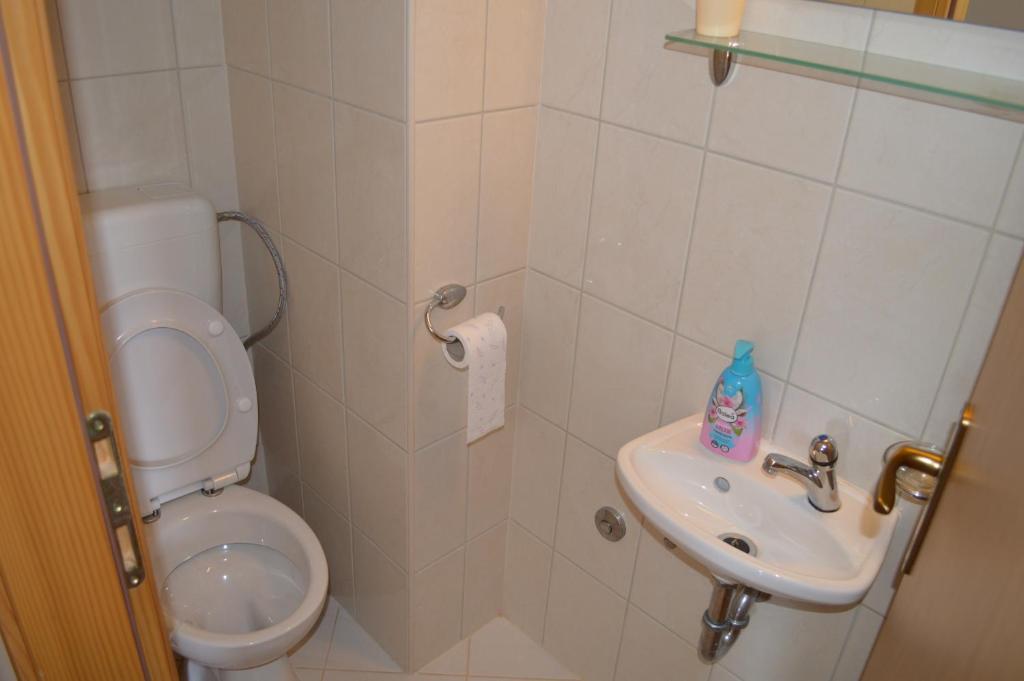 Kúpeľňa v ubytovaní Apartment Quattro