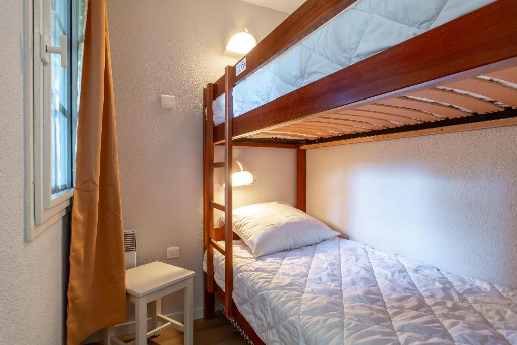 Postel nebo postele na pokoji v ubytování Les Glénans - Duplex vue mer proche plage