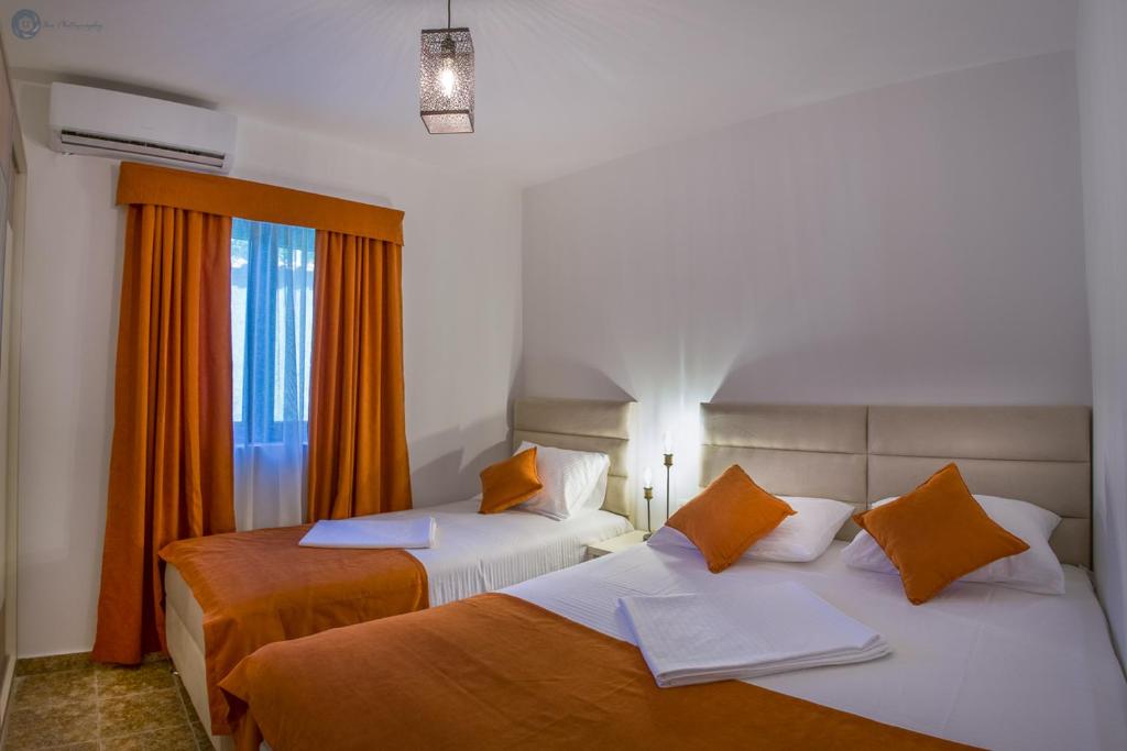 Postel nebo postele na pokoji v ubytování Villa Marco Polo
