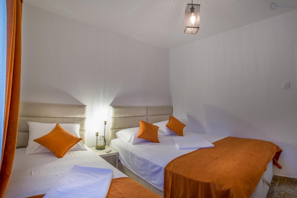 Postel nebo postele na pokoji v ubytování Villa Marco Polo