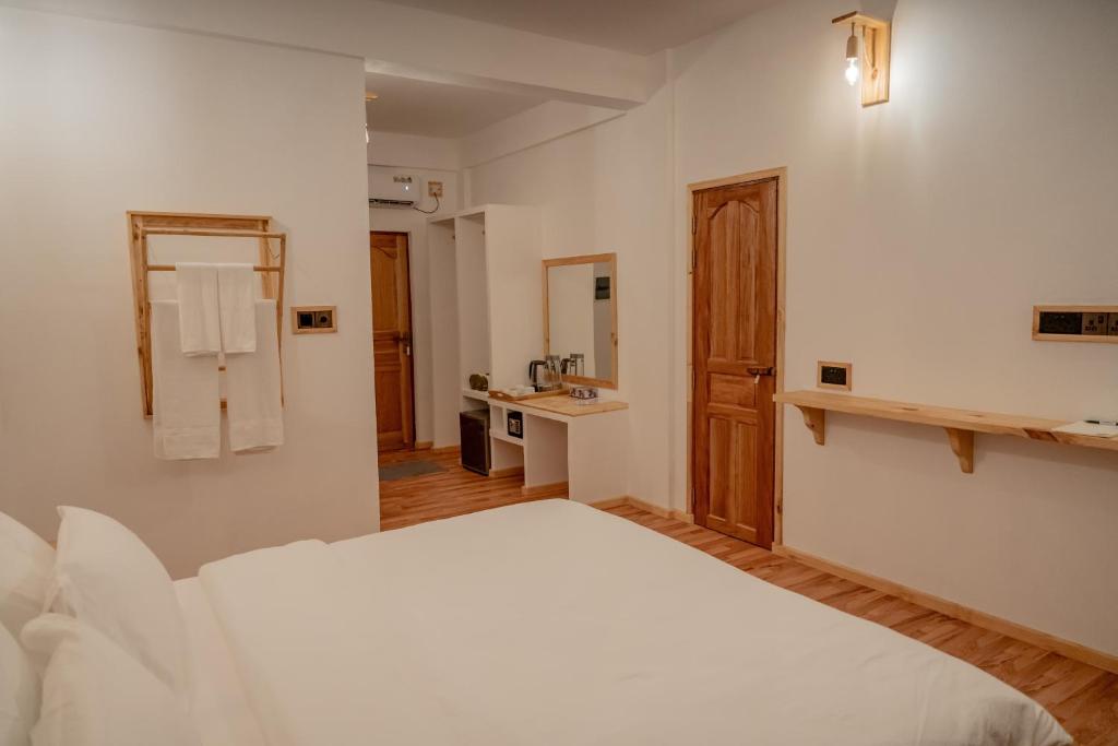 Postel nebo postele na pokoji v ubytování Manta Sea View Himandhoo