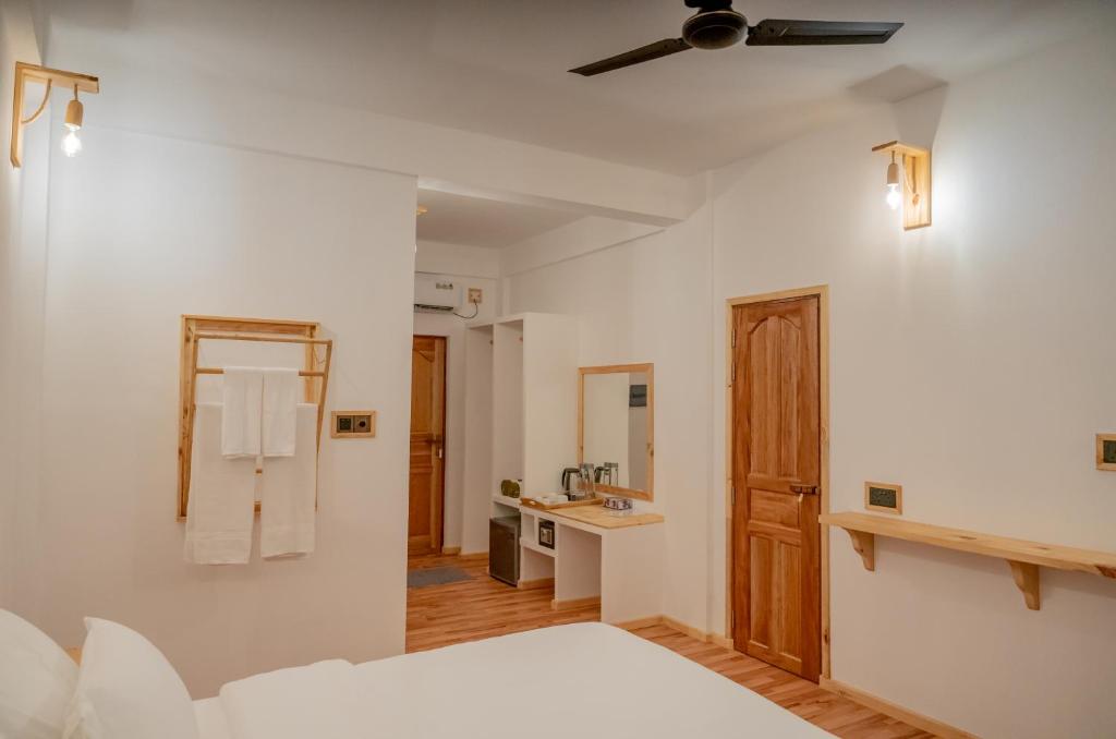 Postel nebo postele na pokoji v ubytování Manta Sea View Himandhoo