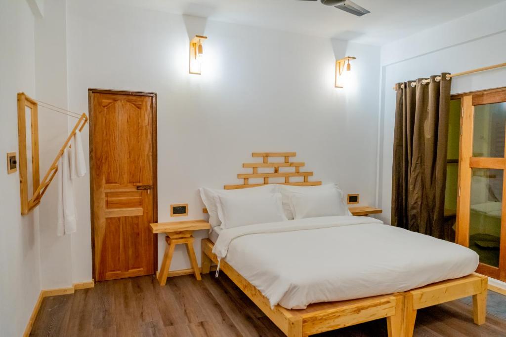 Postel nebo postele na pokoji v ubytování Manta Sea View Himandhoo
