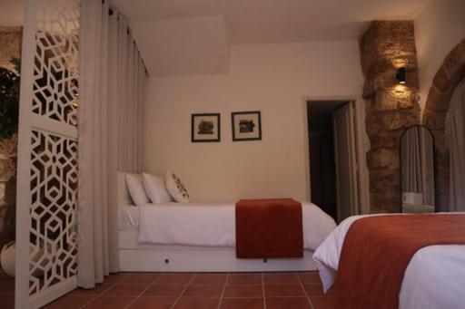Postel nebo postele na pokoji v ubytování Bab El Mina guest house Byblos