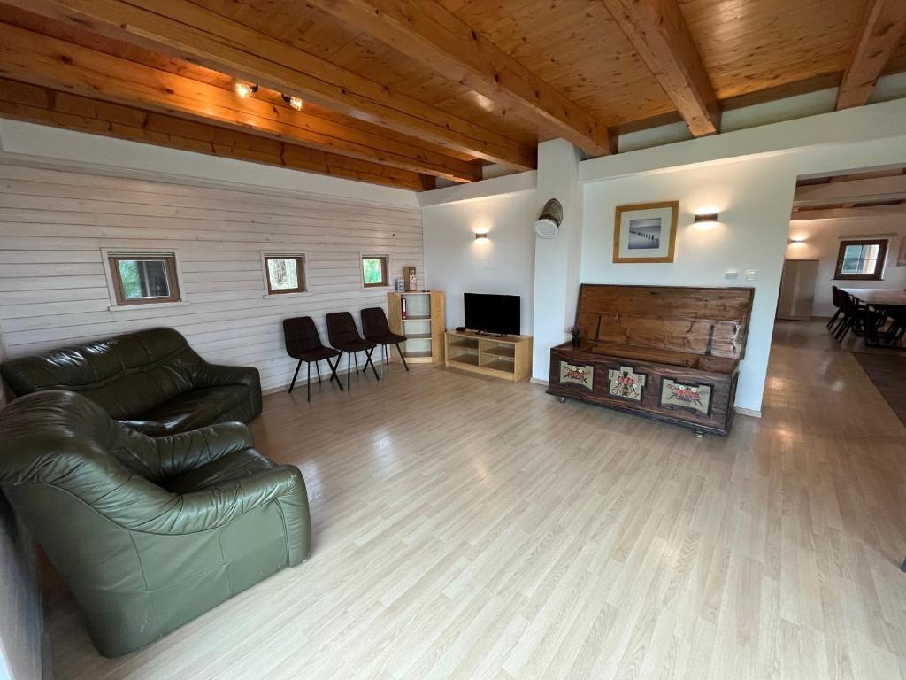 Posezení v ubytování Holiday Home Planina