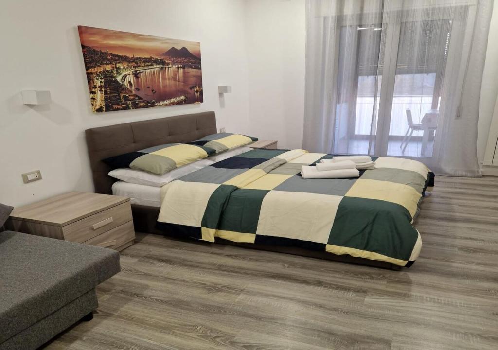 Posteľ alebo postele v izbe v ubytovaní Casa Vacanze Mareluna