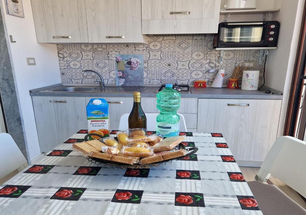 Kuchyňa alebo kuchynka v ubytovaní Casa Vacanze Mareluna