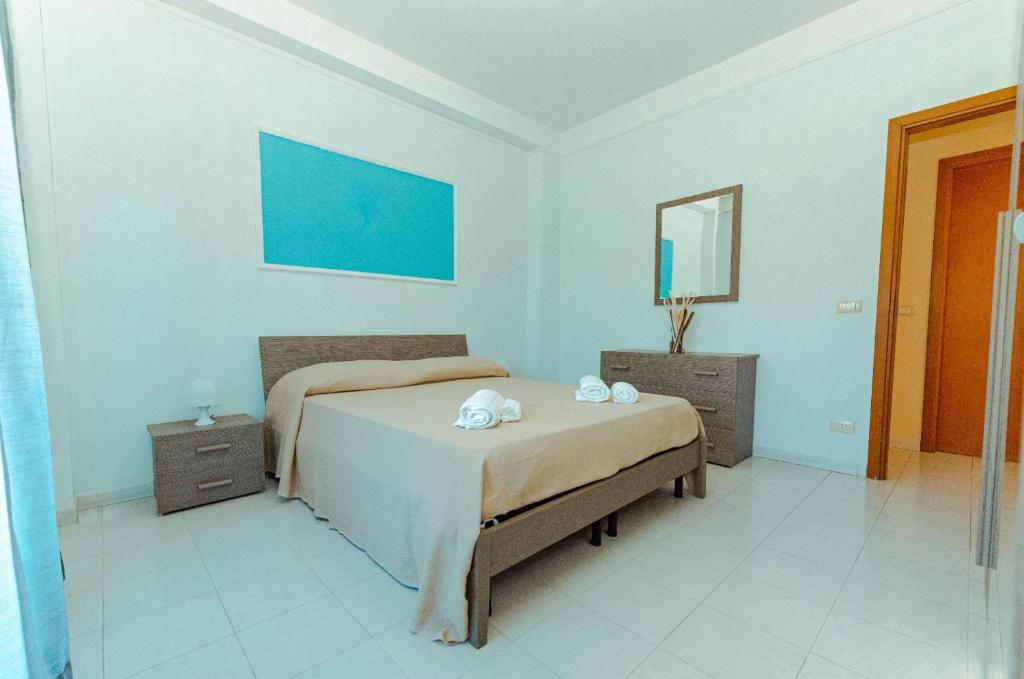 Postel nebo postele na pokoji v ubytování Casa di Mirabella