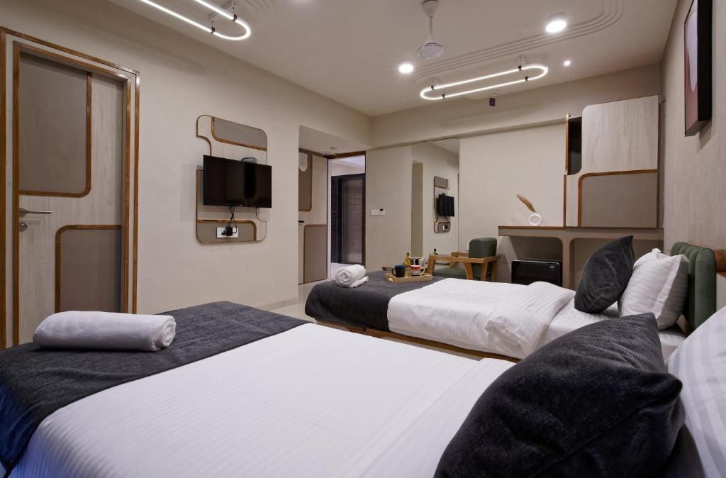 Postel nebo postele na pokoji v ubytování Exora Inn