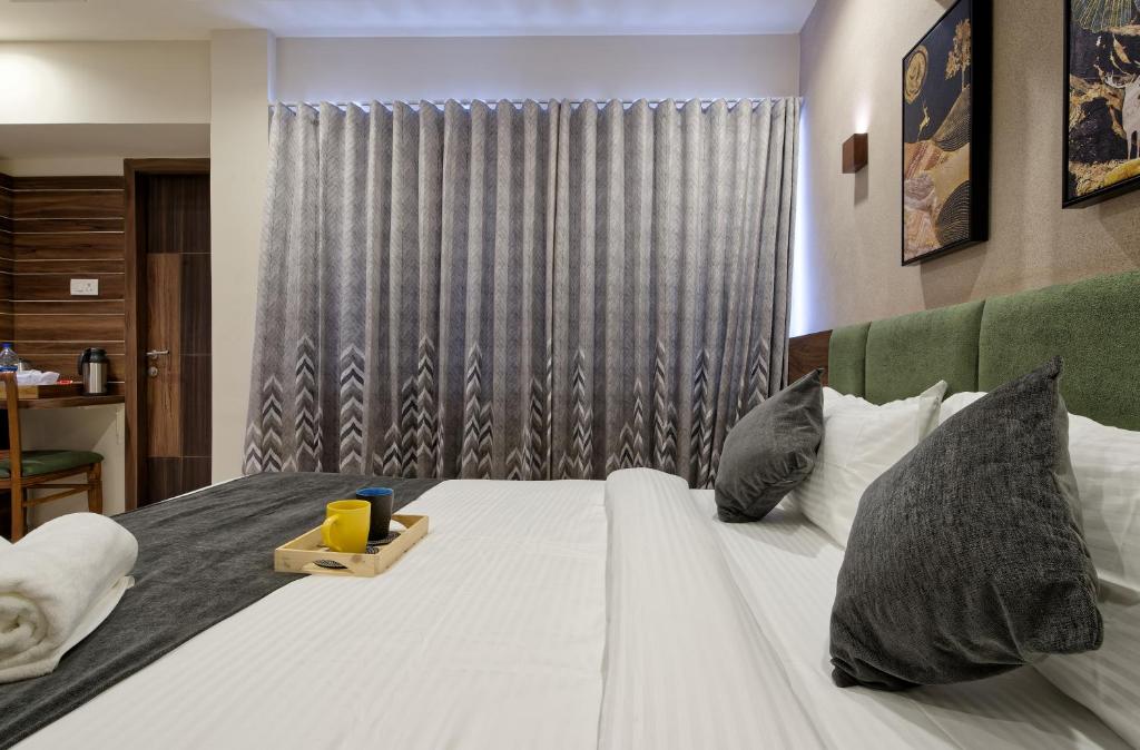 Postel nebo postele na pokoji v ubytování Exora Inn