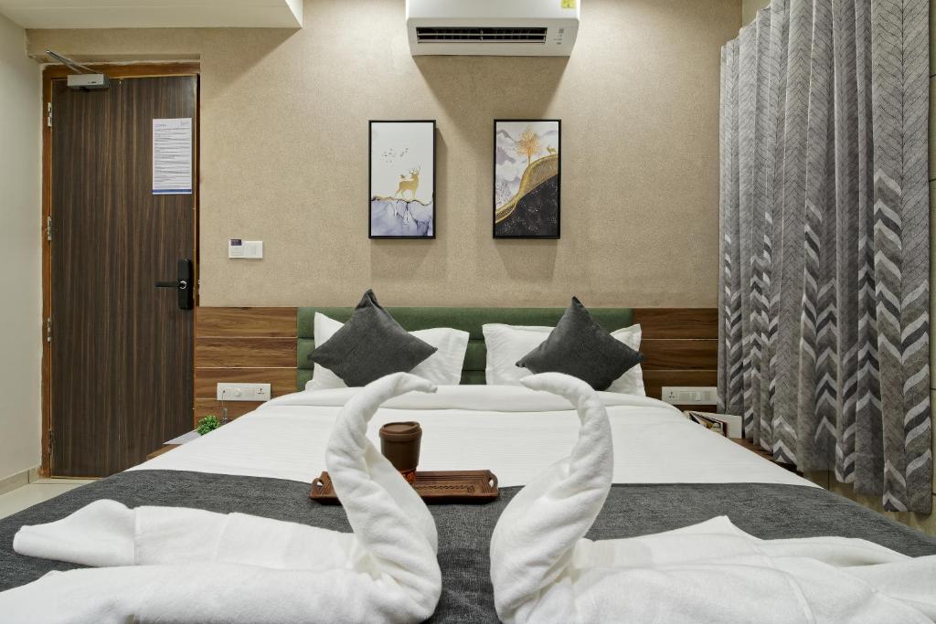 Postel nebo postele na pokoji v ubytování Exora Inn