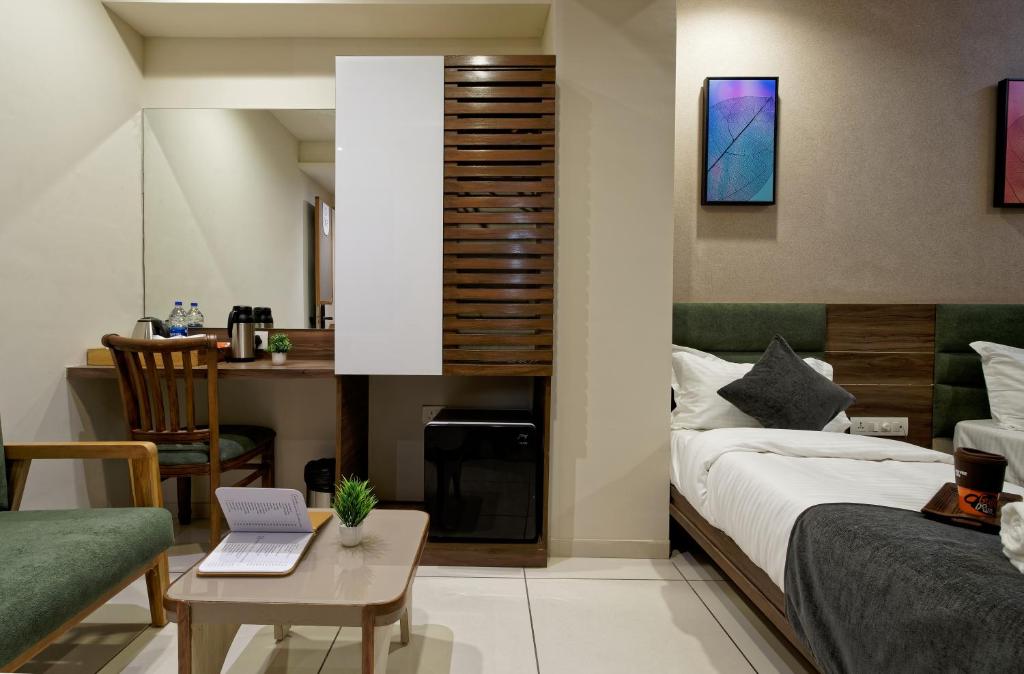 Postel nebo postele na pokoji v ubytování Exora Inn