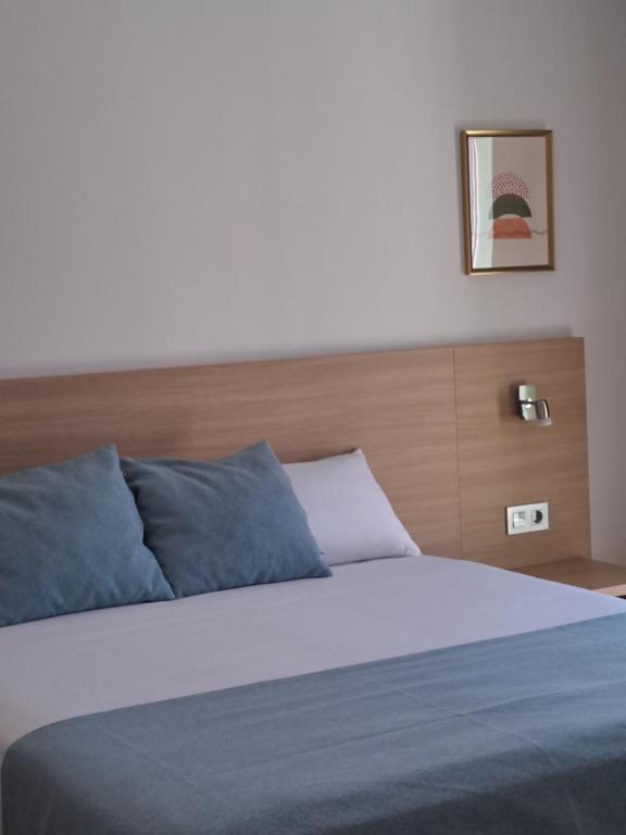 Postel nebo postele na pokoji v ubytování Hotel Mediterrani Express