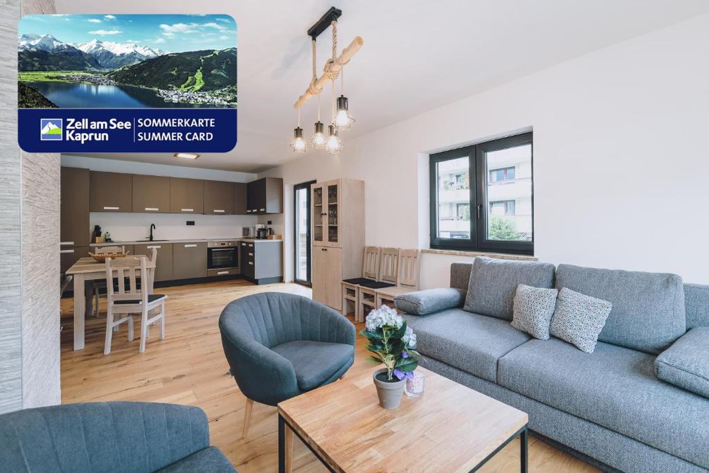 a living room with a couch and a table at Premium Apartments Areit by we rent, SUMMERCARD INCLUDED in Zell am See