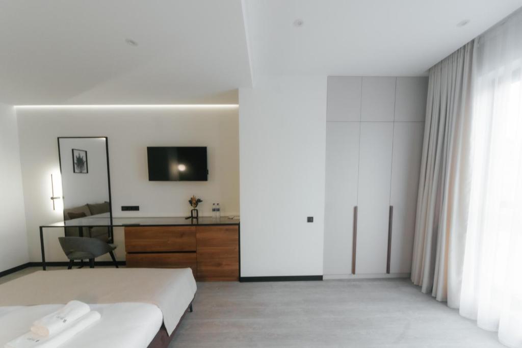 Postel nebo postele na pokoji v ubytování Select Hotel