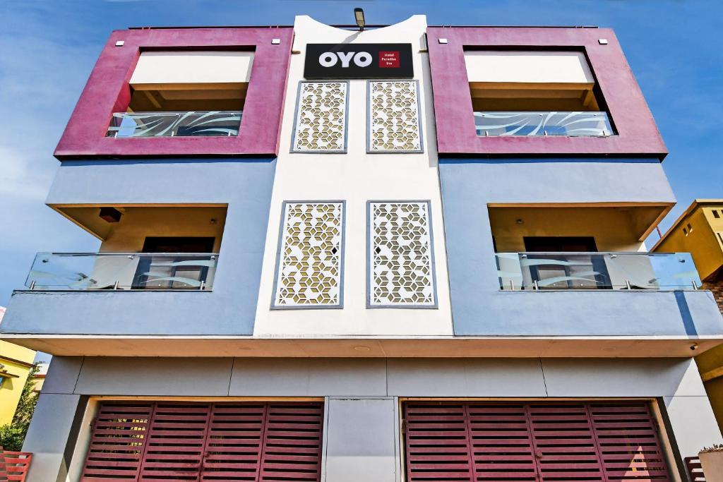 a building with an oops sign on it at OYO Home Modern Stay Near Iter in Khandagiri