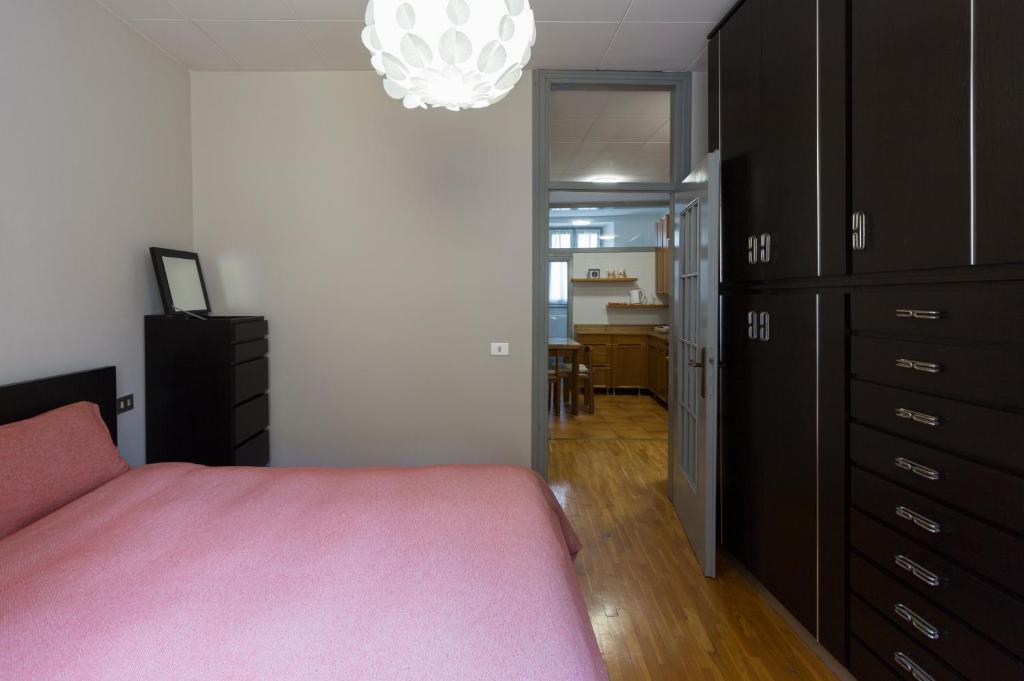 Postel nebo postele na pokoji v ubytování Casa Parravicini