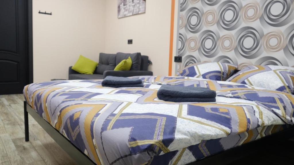 Postel nebo postele na pokoji v ubytování Uneed Rooms M1