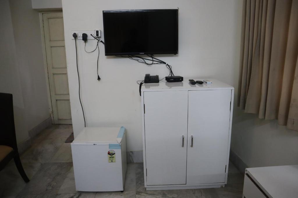 TV a/nebo společenská místnost v ubytování SWET APARAJITA