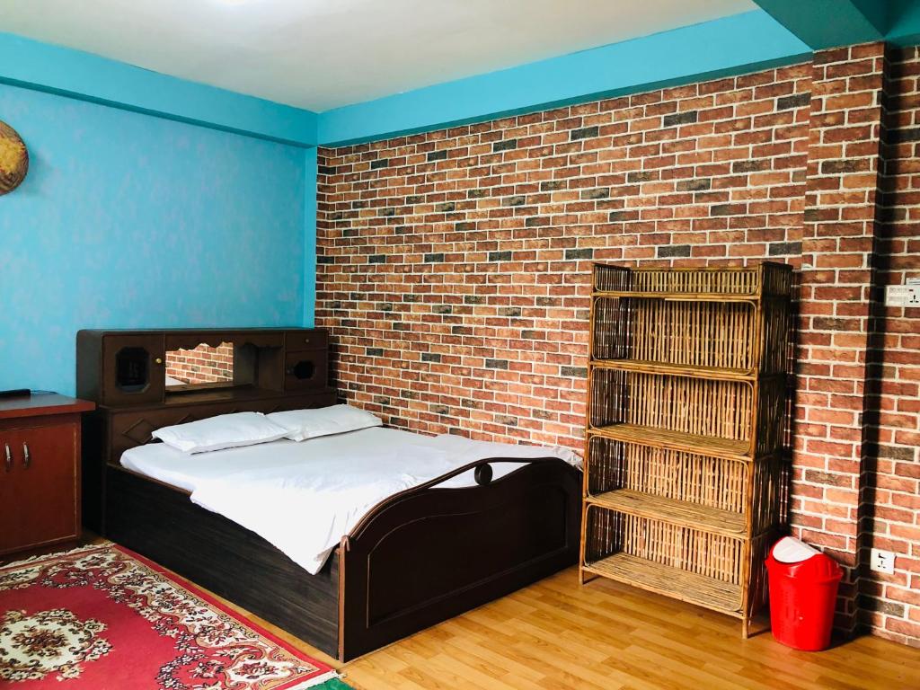 Postel nebo postele na pokoji v ubytování Sara's Backpackers Hotel