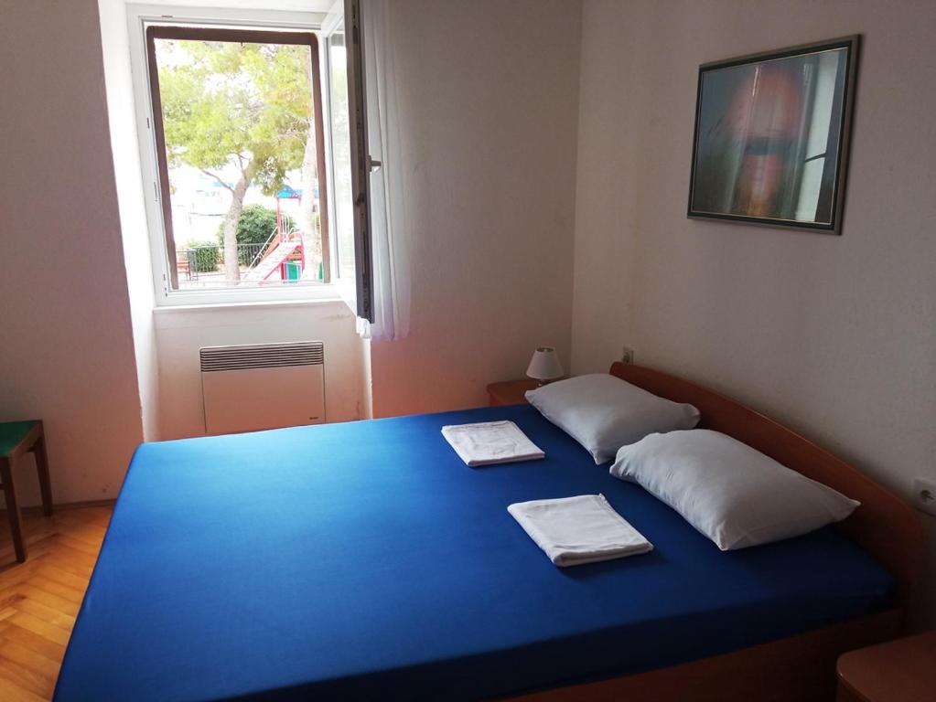 Postel nebo postele na pokoji v ubytování Guesthouse Dante