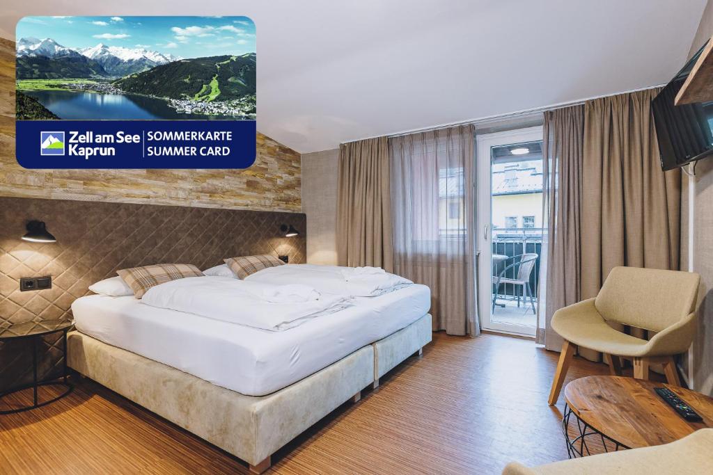 Łóżko lub łóżka w pokoju w obiekcie Alpine City Living by we rent, SUMMERCARD INCLUDED