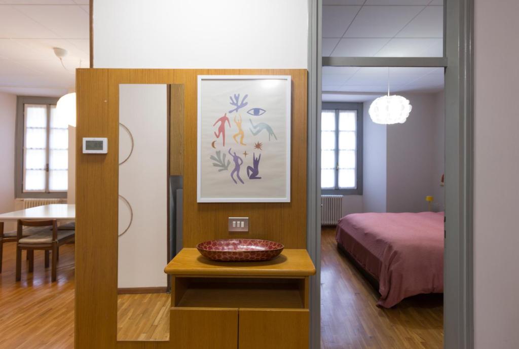 Postel nebo postele na pokoji v ubytování Casa Parravicini