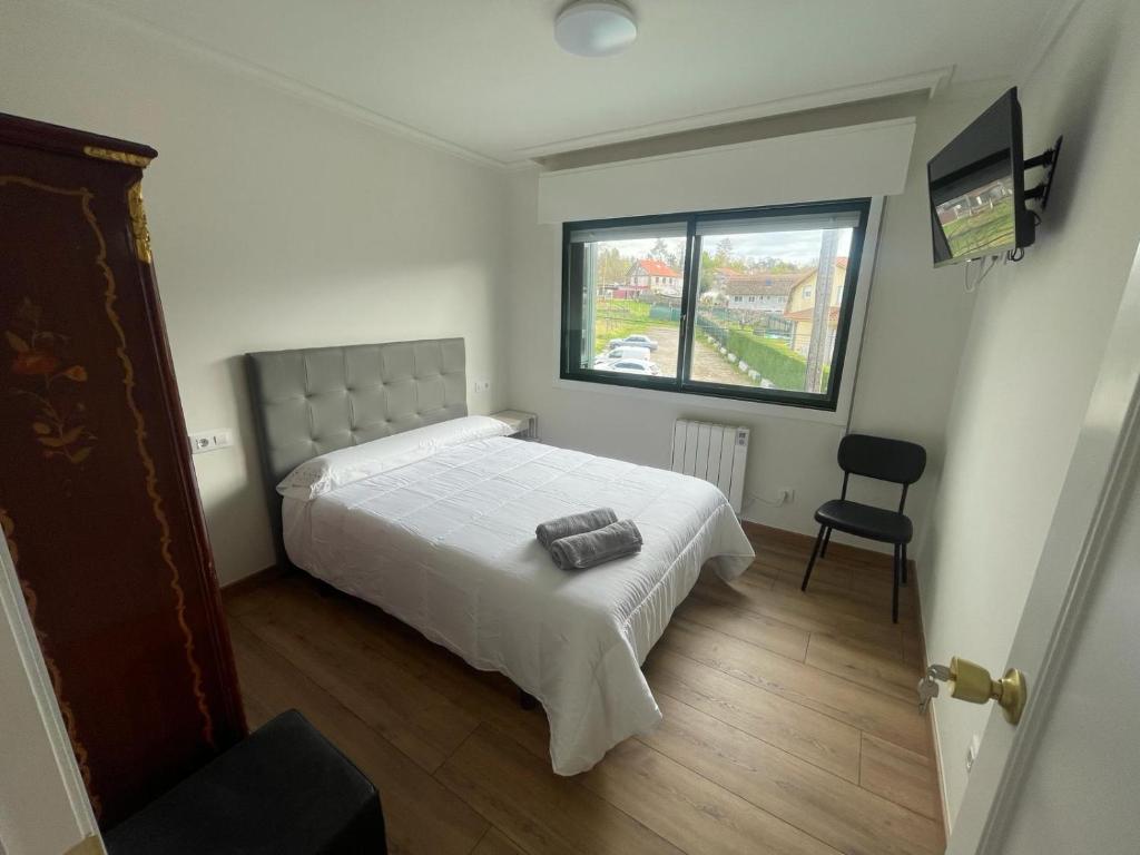 Cama o camas de una habitación en Posada Celtia